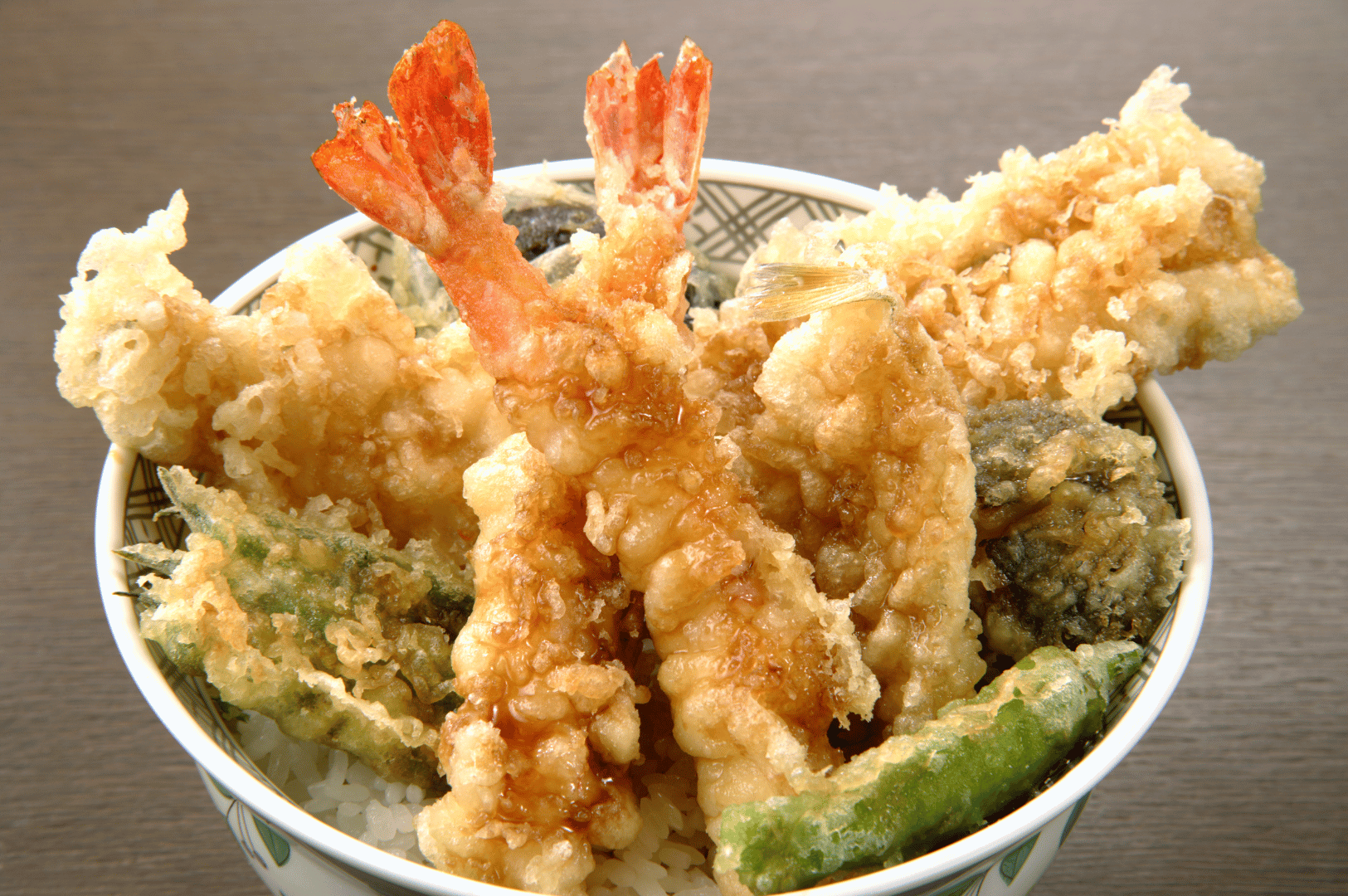 Japanese Tiger Prawn tempura and seasonal vegetables—green beans, eggplant, and sweet potato—served over steamed rice and drizzled with savory sauce in a tendon bowl, capturing Yamato’s omakase finale where comfort meets culinary precision under expert scrutiny.