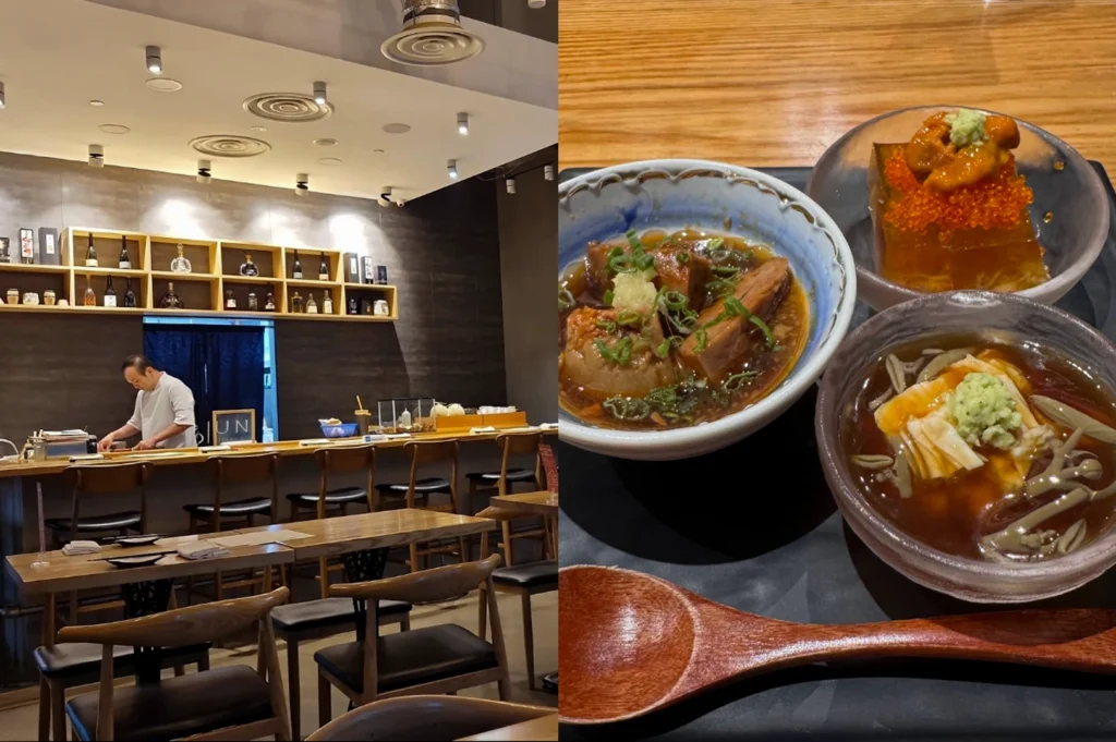 A split-screen composition featuring a modern Japanese dining room and three small appetizers. The left side shows the interior of "Jun Omakase" where a chef in white work behind a clean wooden counter lined with high-backed leather chairs and a backlit shelf displaying premium sake bottles. The right side displays a trio of small glass and ceramic bowls containing braised meat in a savory broth, a jelly-like cube topped with sea urchin and roe, and a creamy tofu skin dish accented with fresh wasabi.