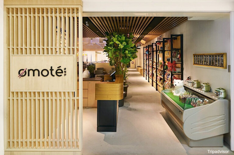 Exterior view of a store named "Omote" located in Thomson Plaza, featuring a clear and inviting sign.