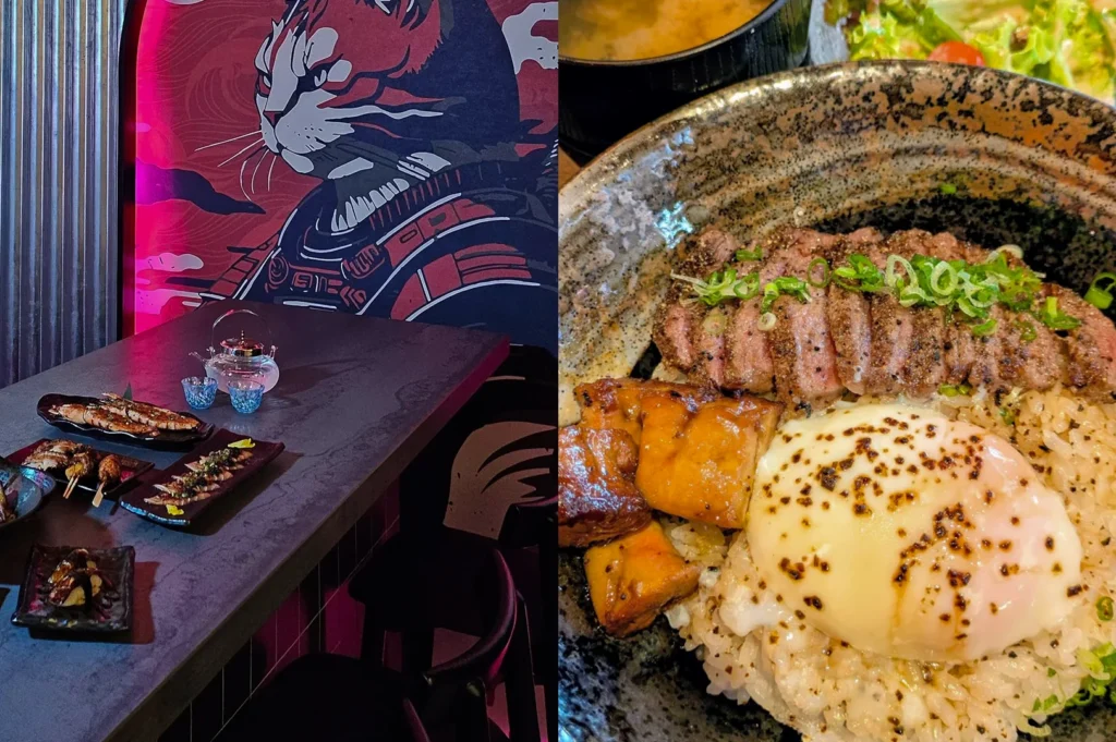 A split-screen image showcasing a vibrant dining experience: the left side captures a dark, atmospheric restaurant interior with a large wall mural of a cat dressed as a samurai, while the right side displays a close-up of a Japanese rice bowl topped with sliced wagyu beef, a soft-poached egg with furikake, and grilled foie gras. The composition highlights the fusion of modern artistic decor with traditional, high-quality Japanese comfort food.