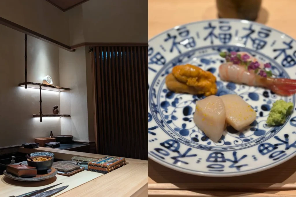 A side-by-side split layout highlighting the restaurant's interior design and an artisan seafood plate. On the left, a minimalist corner of the restaurant features a light wood counter with prep bowls and a decorative lacquered box, set against a muted beige wall with floating dark wood shelves delicately illuminated by built-in under-shelf lighting. On the right, a close-up reveals a round blue-and-white patterned ceramic plate decorated with traditional Chinese characters for "good fortune" (福), holding a curated arrangement of fresh seafood including a scoop of orange sea urchin (uni), two pieces of translucent raw scallop garnished with citrus zest, a whole raw sweet shrimp topped with purple micro-flowers, and a small mound of green wasabi.